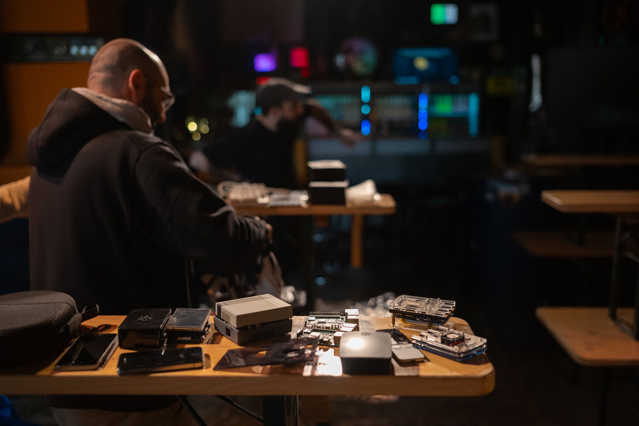 A table of Raspberry Pi computers and assorted mobile phones